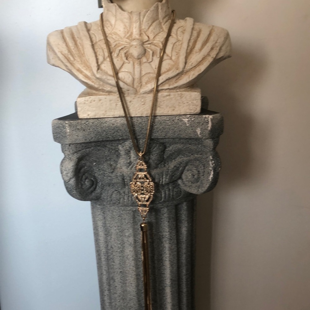 Gold tassel necklace